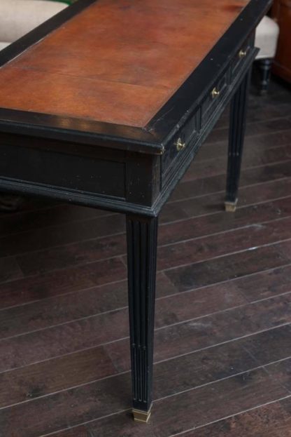 Garden Court Antiques, San Francisco - Ebonized three-drawer bureau plat with embossed leather top, French, circa 1880.