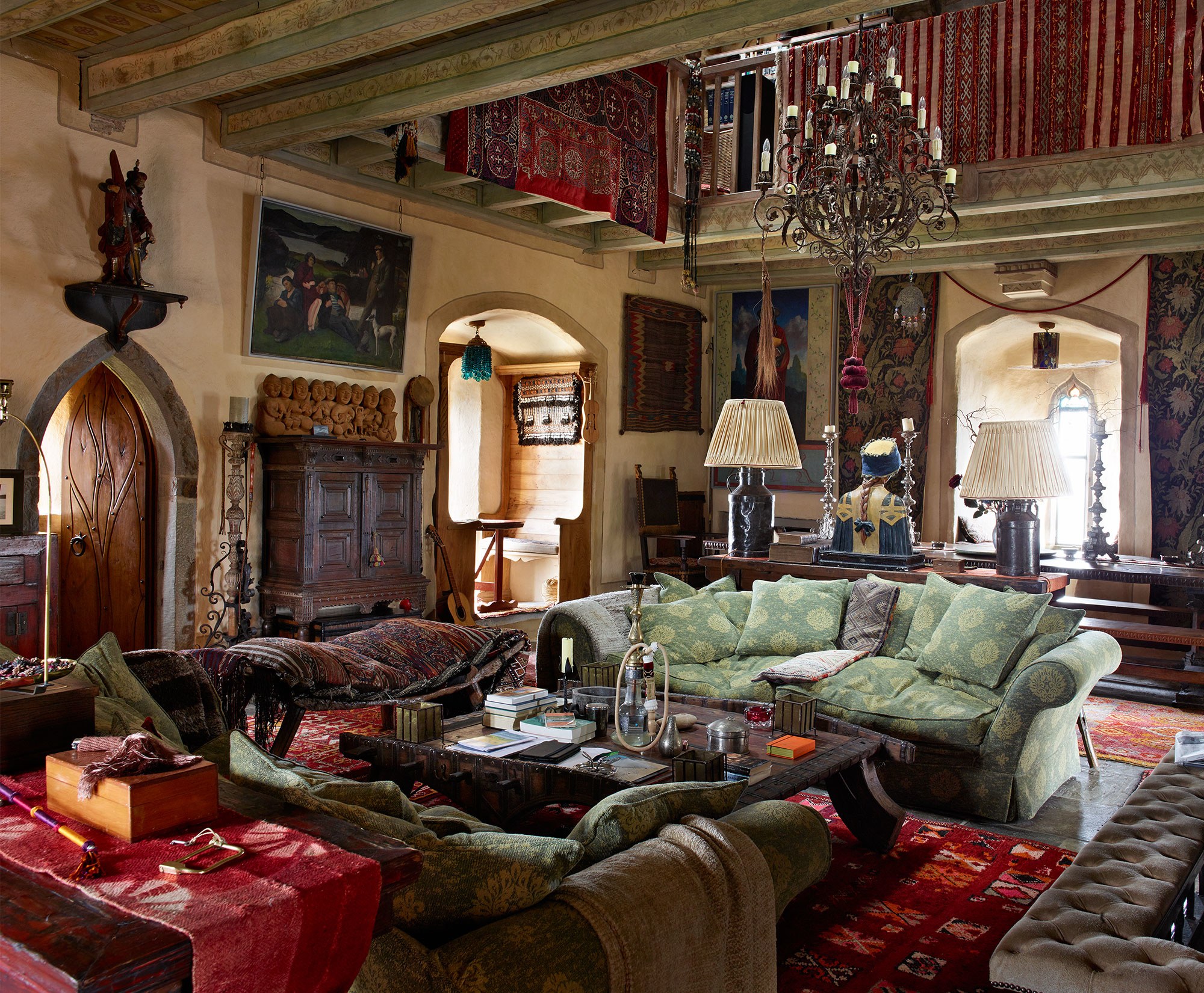 Kilcoe’s main living area, known as the “solar,” showcases art and collectibles acquired by Irons in his travels. Photograph by Simon Upton.