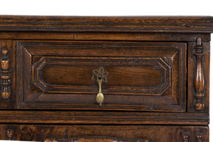 Late 17th/Early 18th Century Oak Cupboard Adorned With Decorative Geometric Mouldings And Split Spindle Appliqués.