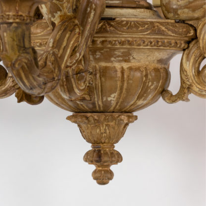 A 19th Century Carved Wooden Eight Light Chandelier.