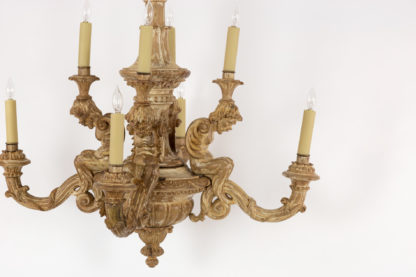 A 19th Century Carved Wooden Eight Light Chandelier.