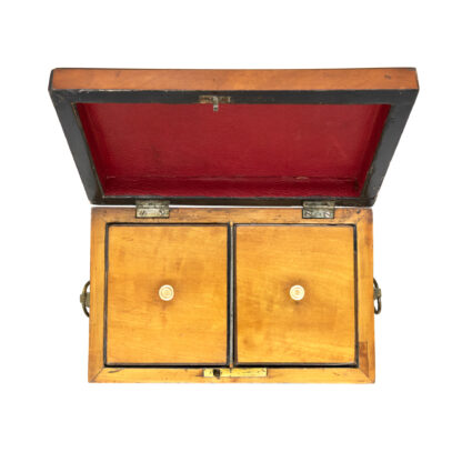 Tow compartments of a Satinwood Tent Top Tea Caddy With Two Interior Compartments; English, Circa 1840.