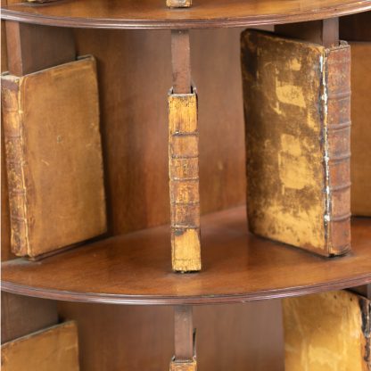 Four Tiered Edwardian Mahogany And Leather Revolving Bookcase With Faux Book Dividers, English Circa 1900.