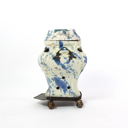 A Continental Faience Portable Stove And Cover, Late 18th/19th Century