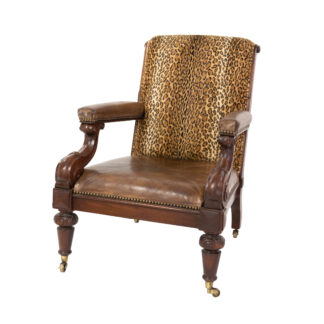Carved Mahogany Club Chair With Leather Seat And Arm And Leopard Print Back; English Circa 1950