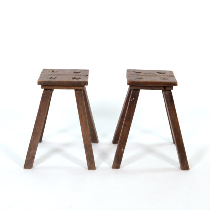 A Pair Of Country Work Stools With Square Patinated Pine Twin Planked Seats, English Circa 1870.