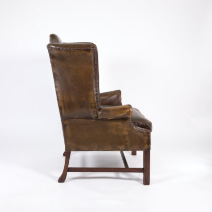 Dark Muddy Green Leather Wing Chair in the Georgian Style, English Circa 1890.