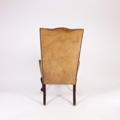 Large Scale English Ochre Leather Wing Chair With Button Tufted Back, Circa 1900