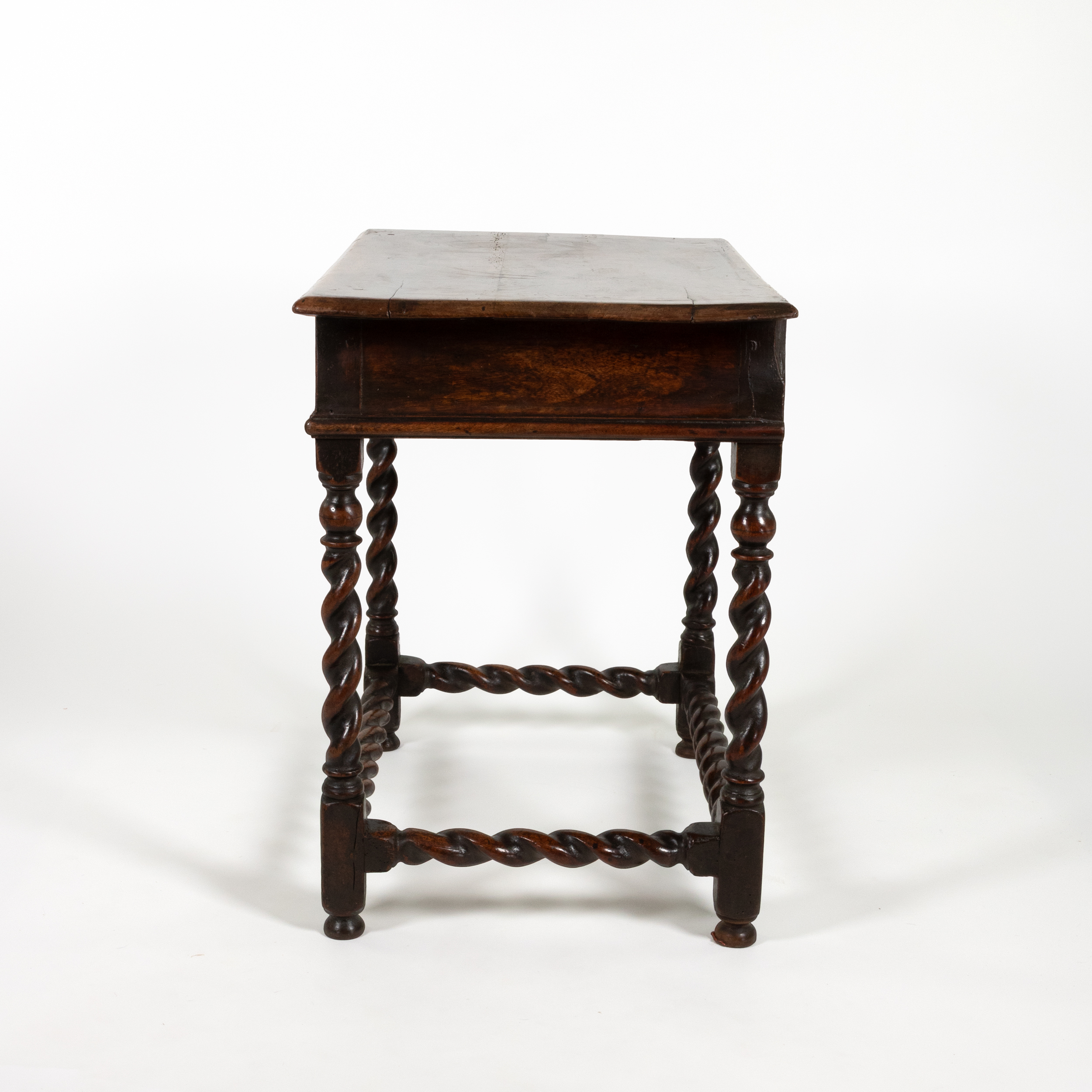 Side profile of antique English oak table