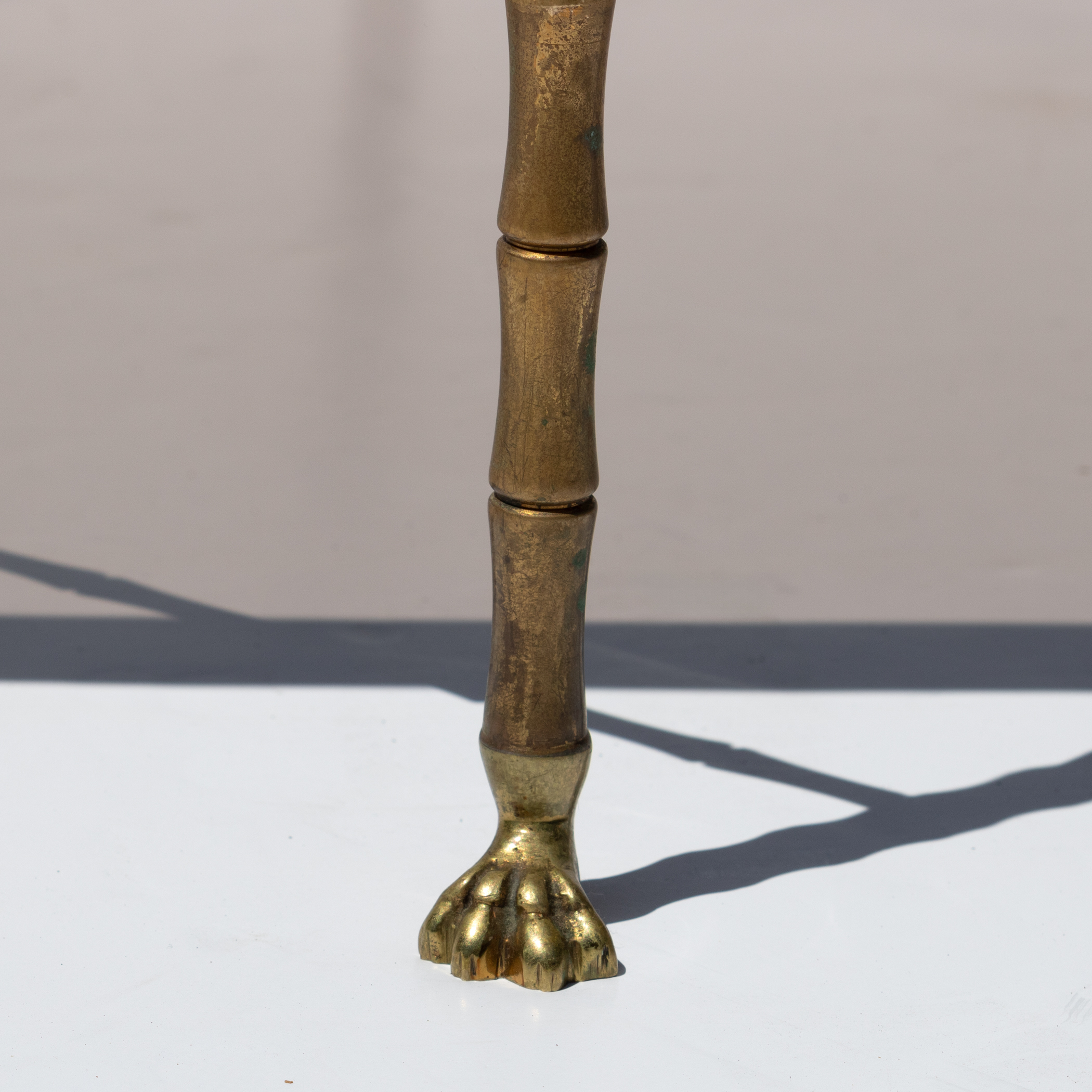 Brass bamboo leg and paw foot detail Maison Baguès table