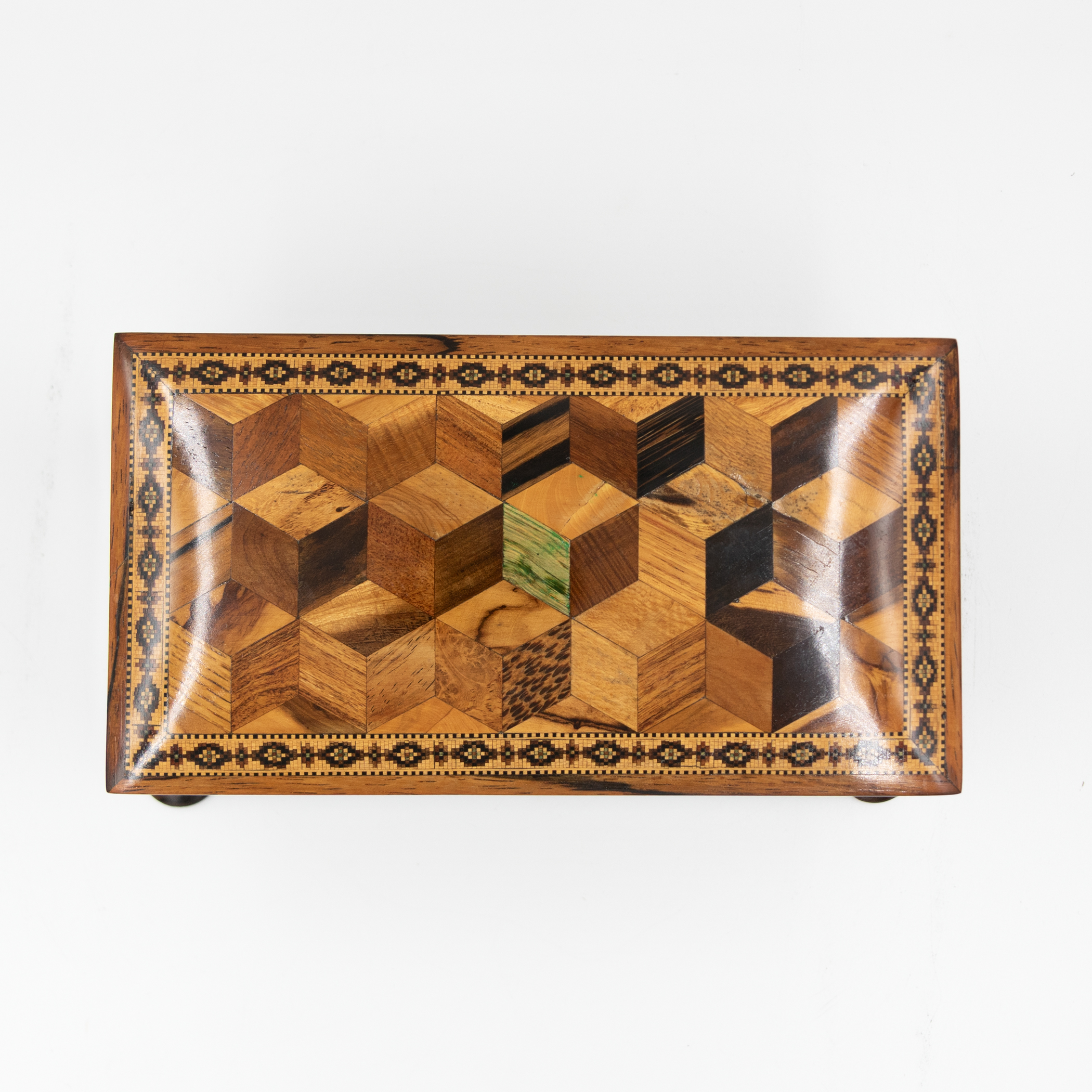 English Tunbridge ware box top view showing tumbling-block perspective inlay in multiple woods