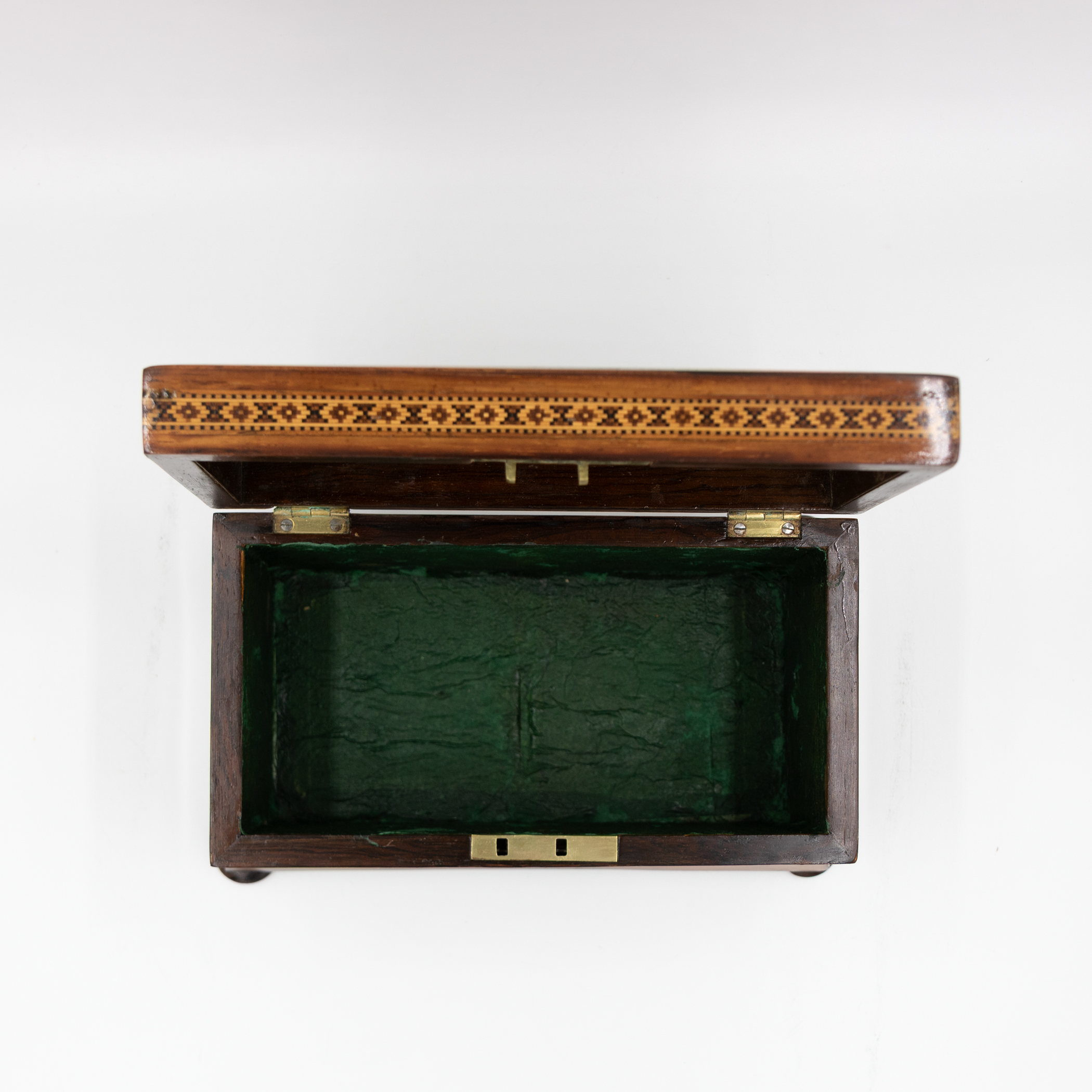 Victorian Tunbridge ware box overhead view showing tumbling-block inlay and green interior