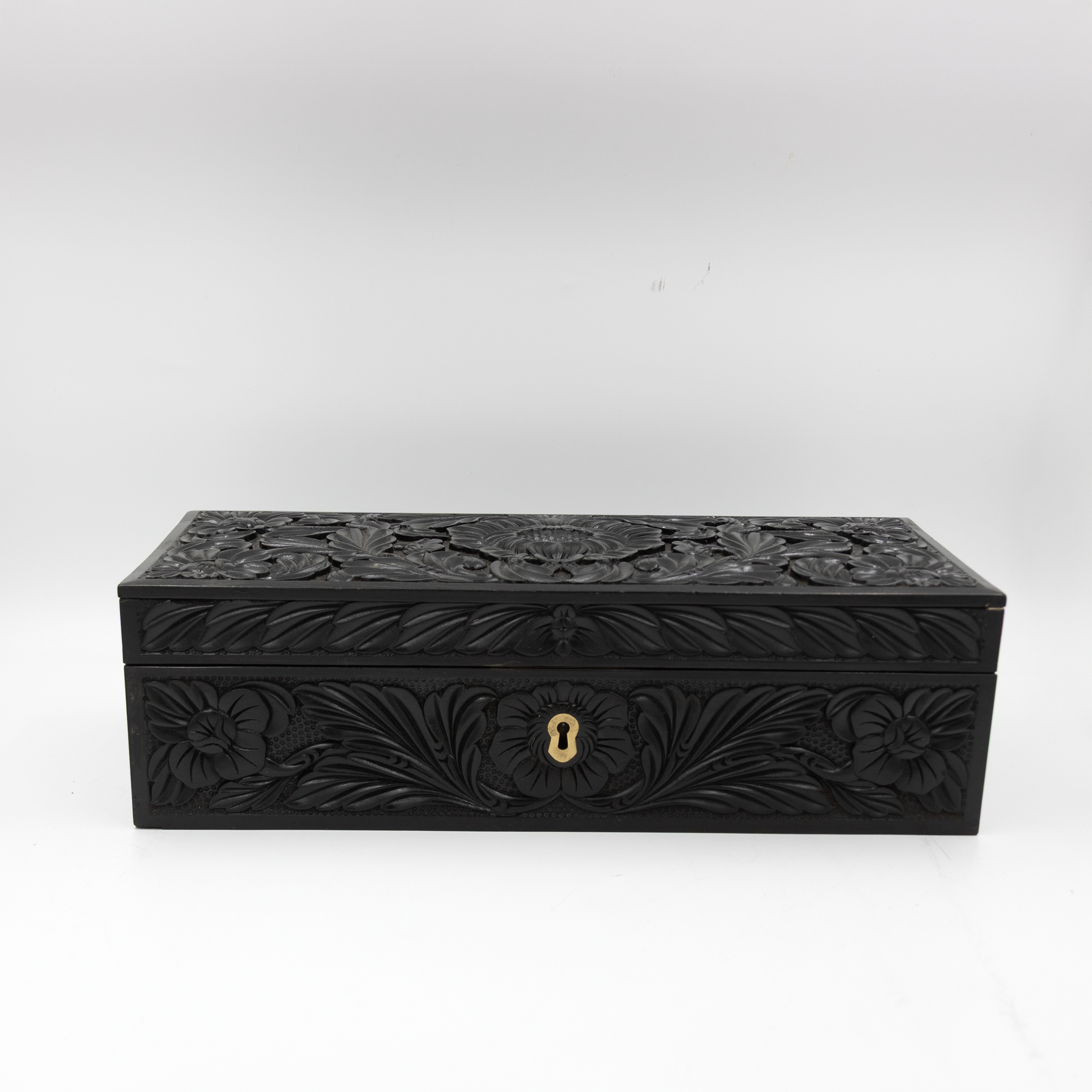 Straight front view of ebony box.