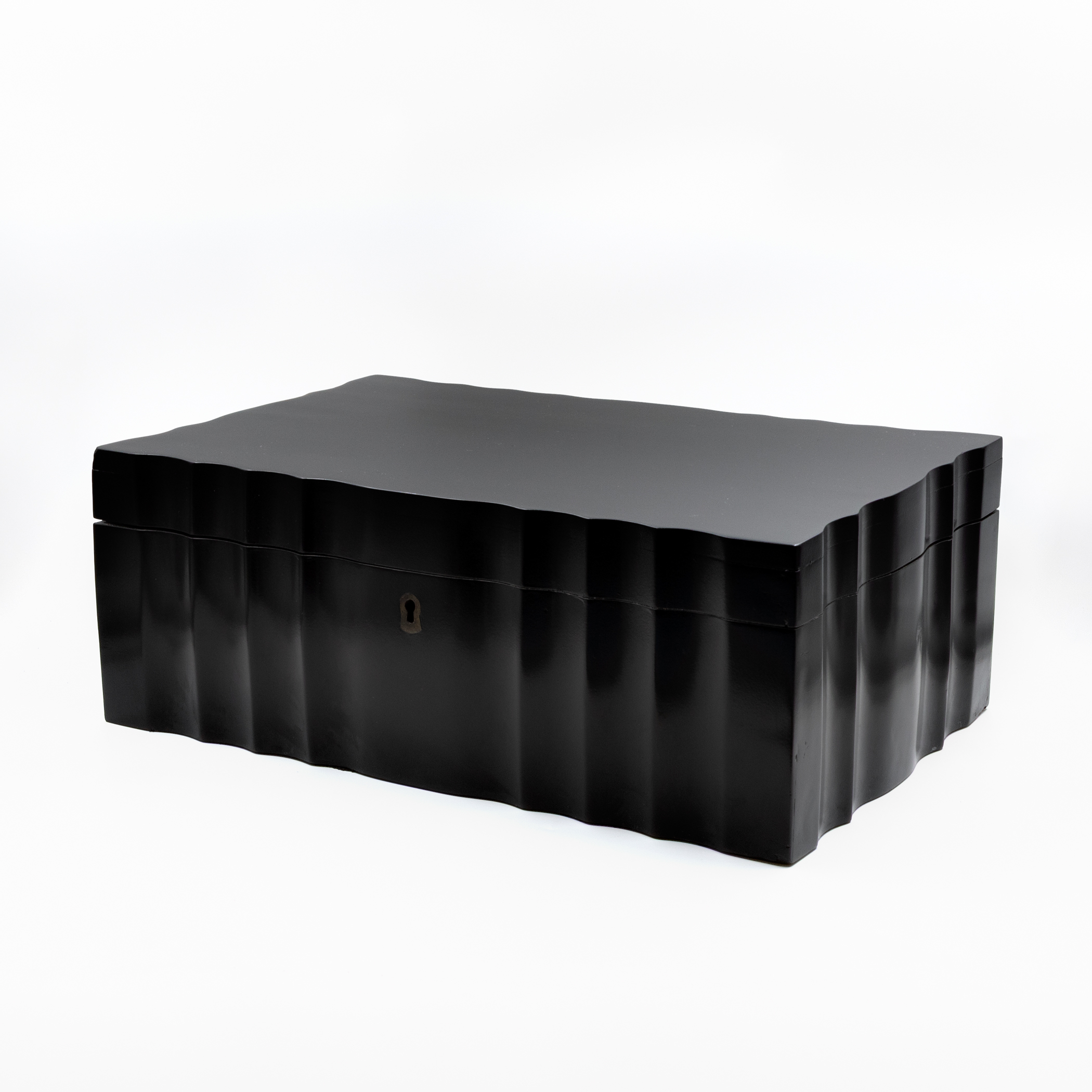 Anglo-Indian serpentine ebony box, circa 1840, three-quarter front alternate view