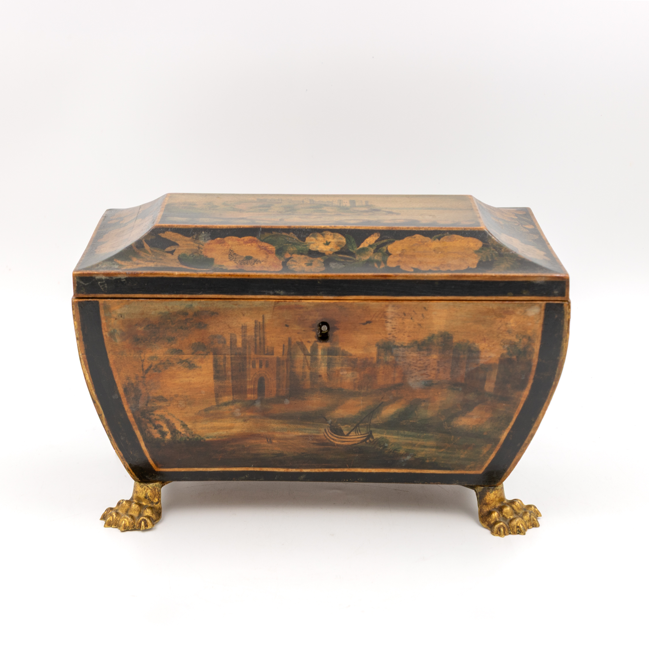 Regency painted and penwork bombe box on gilt lion paw feet front view