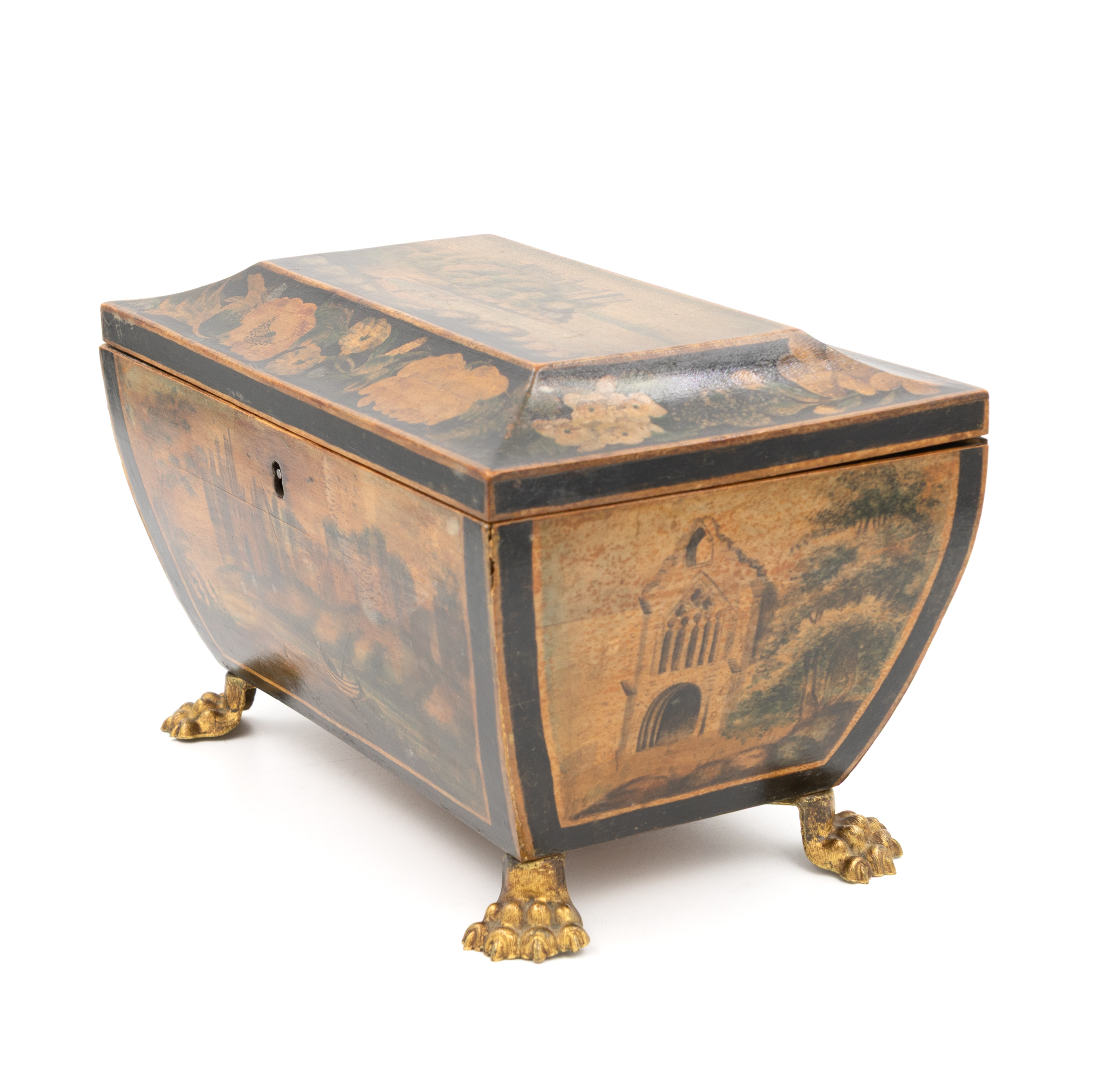 Regency penwork box three quarter view showing floral frieze lid and landscape panel