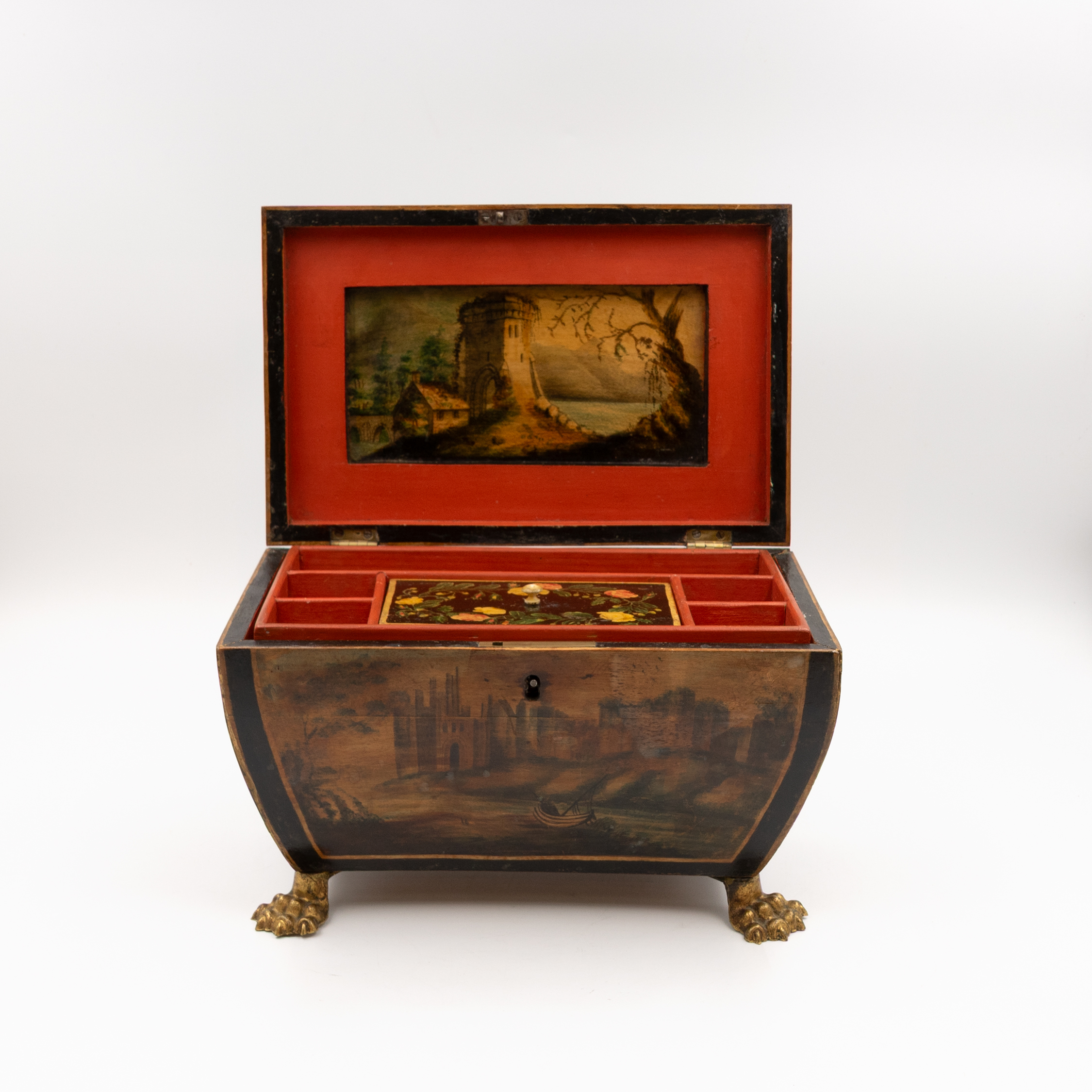 Direct front view of open Regency box with red compartments and central painted tray lid