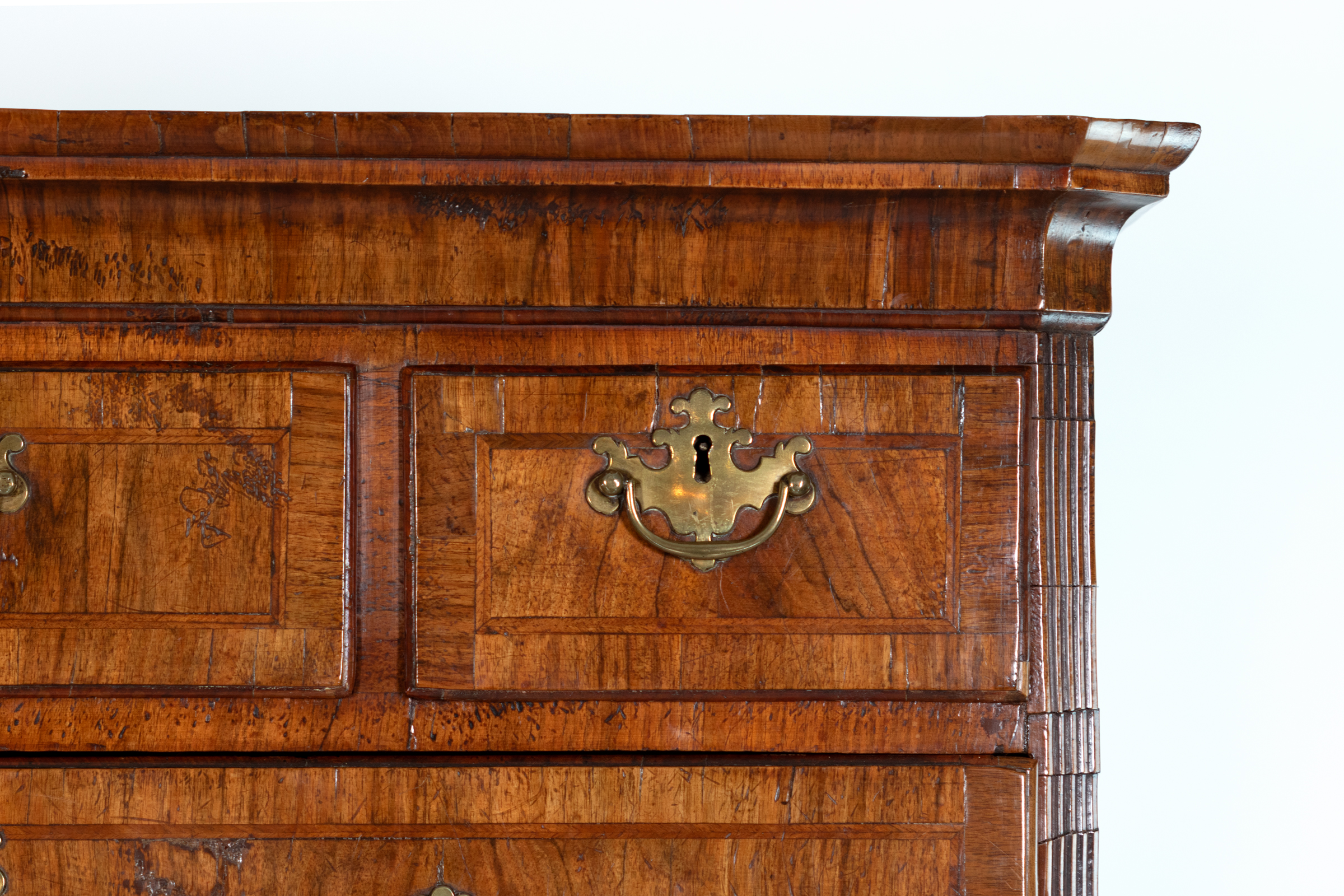Molded cornice and reeded quarter-column detail, Georgian walnut chest on chest, circa 1720