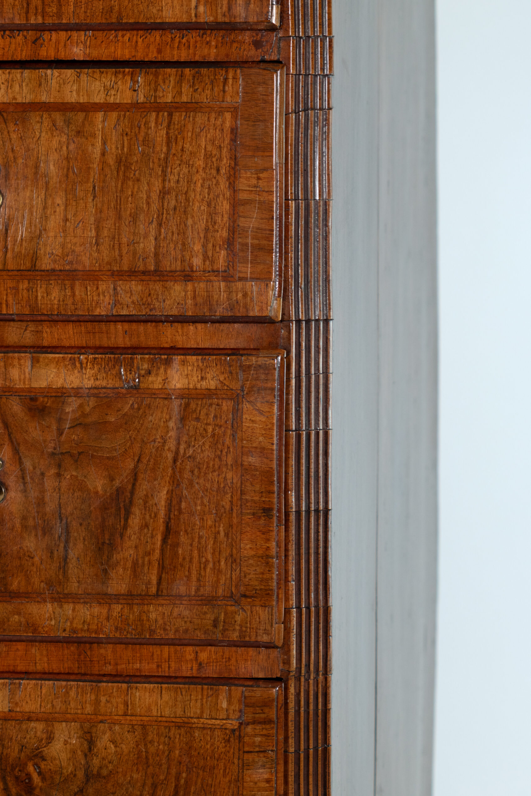 Reeded quarter-columns to carcass corner, Georgian walnut chest on chest, English, circa 1720