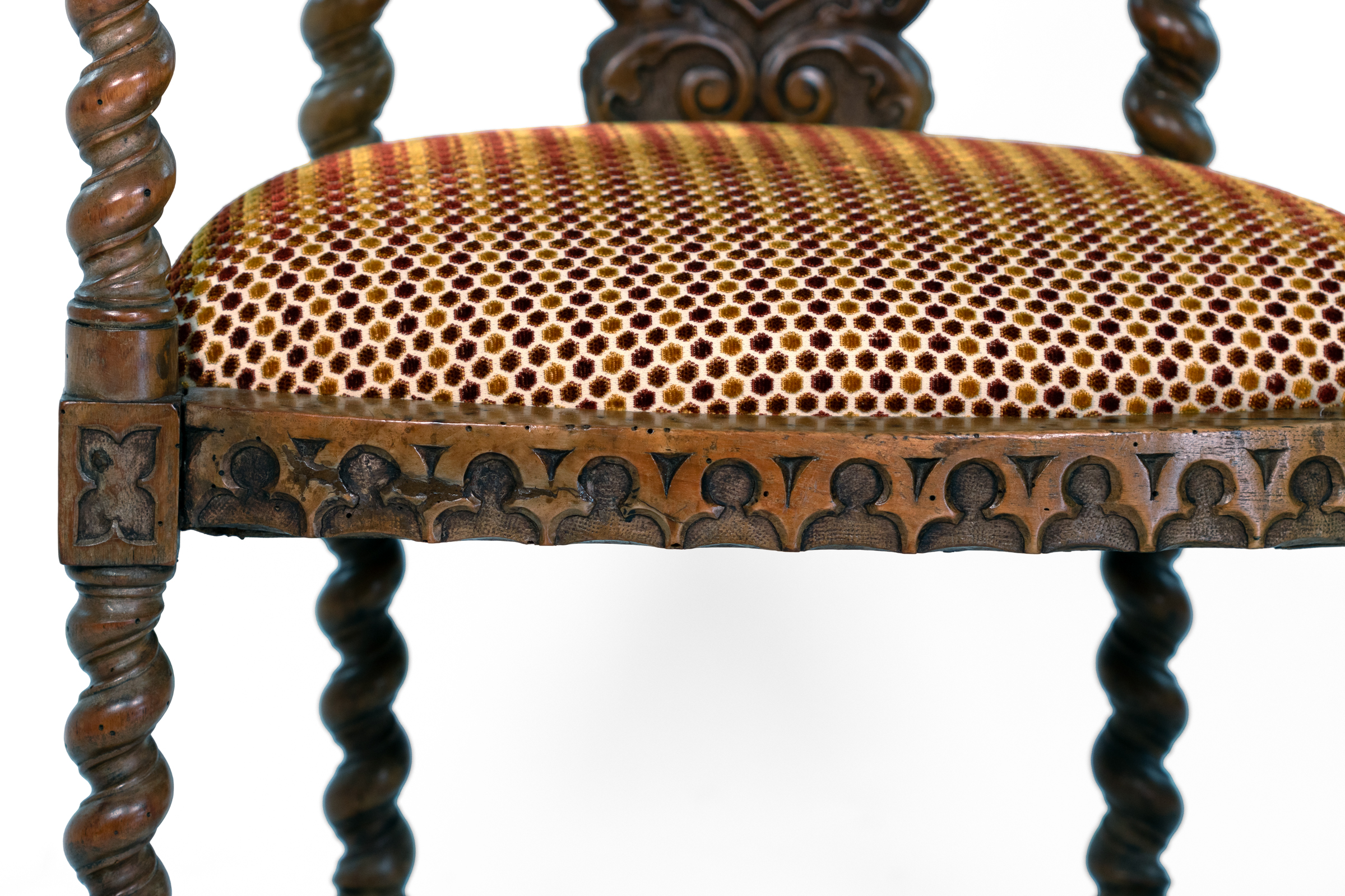 Detail of carved Gothic apron on English Gothic Revival yew tub chair