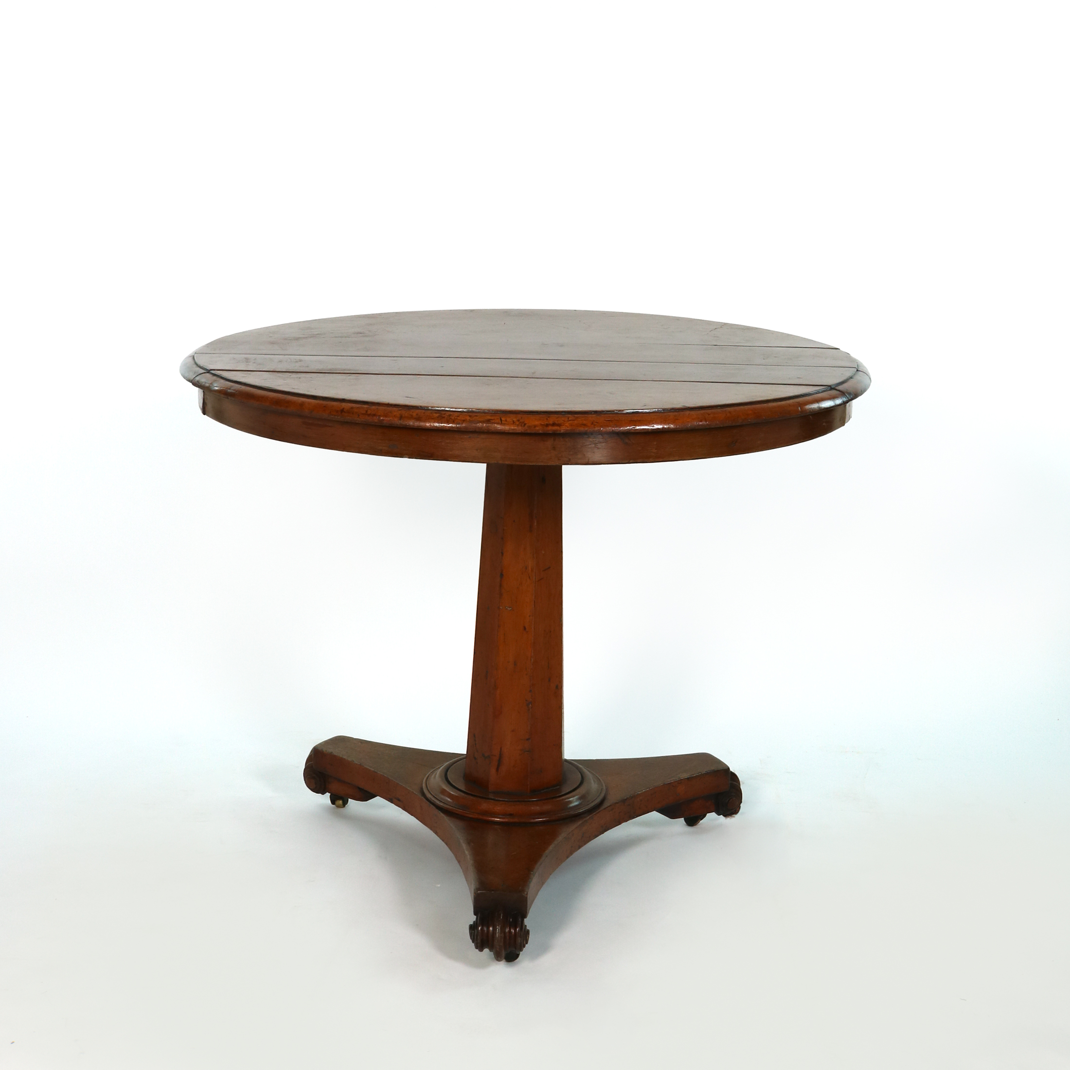 English fruitwood center table, circa 1850, viewed from the opposite side with octagonal pedestal and tripod base