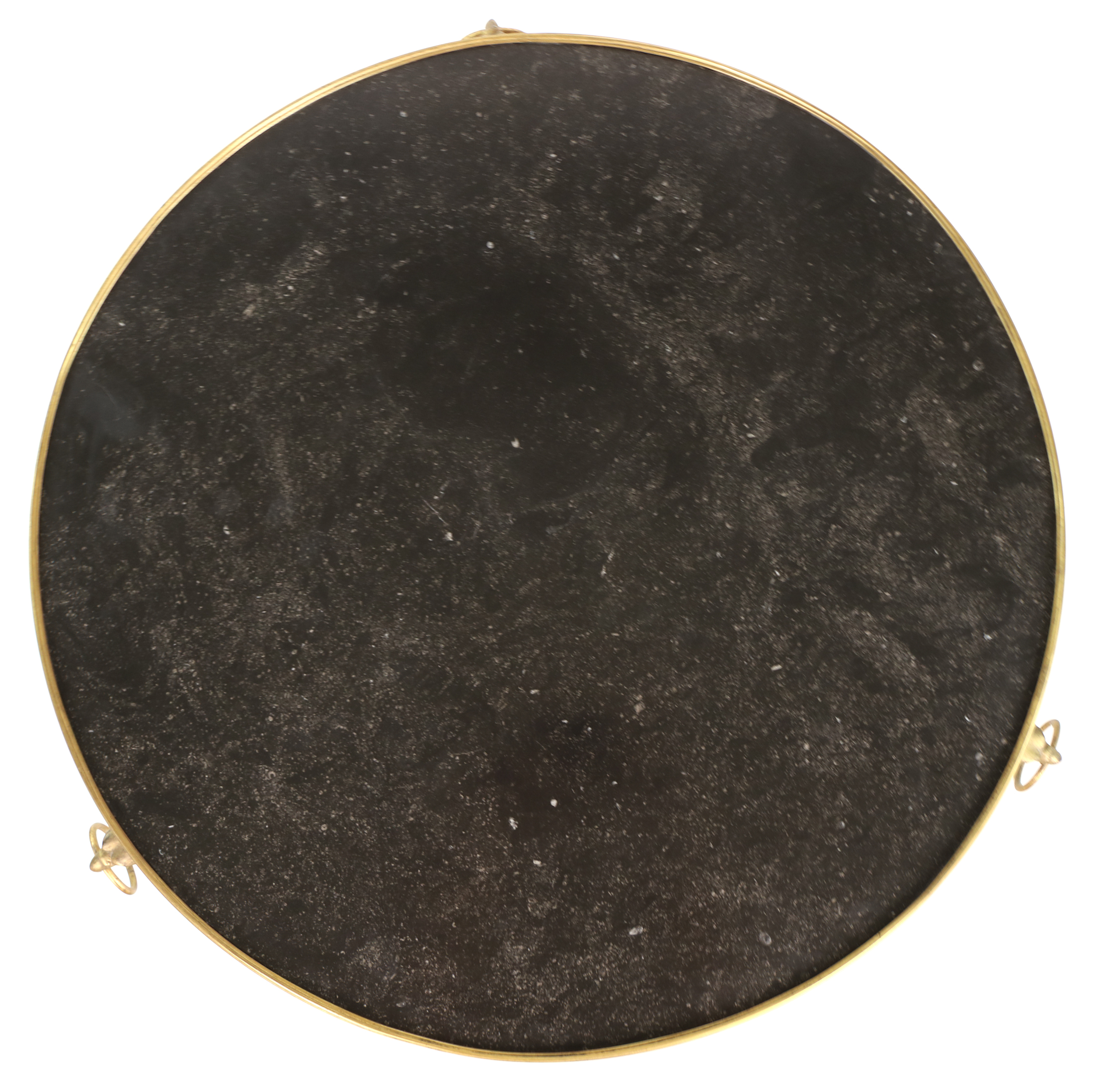 Overhead detail of the circular black fossil marble top of a French gilt-bronze gueridon, circa 1880