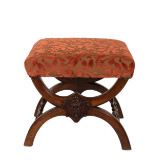 Carved walnut curule-form stool, French circa 1830, front view with cut velvet seat and carved mask