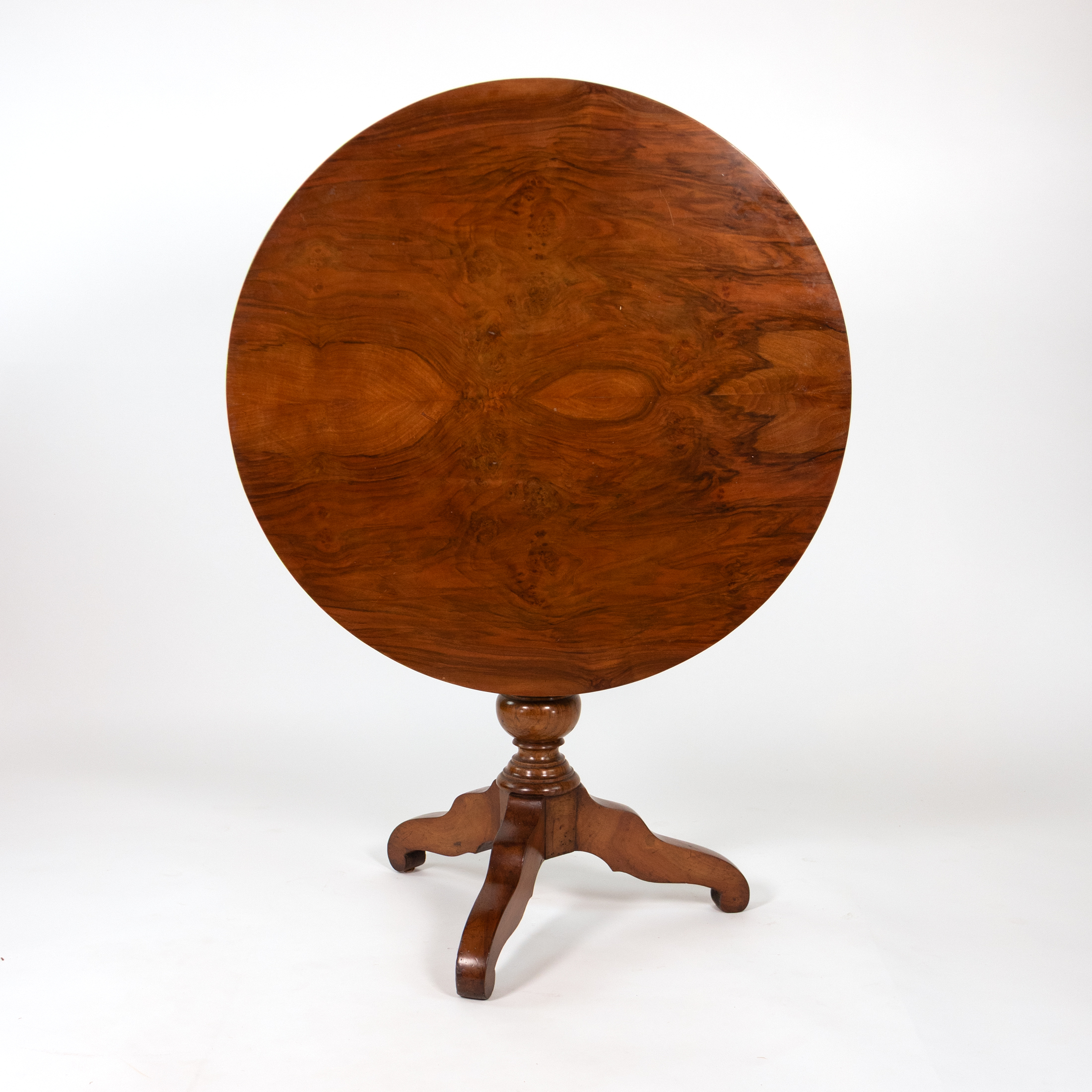 English Victorian tilt-top side table, circa 1870, with top raised to show the figured circular surface.
