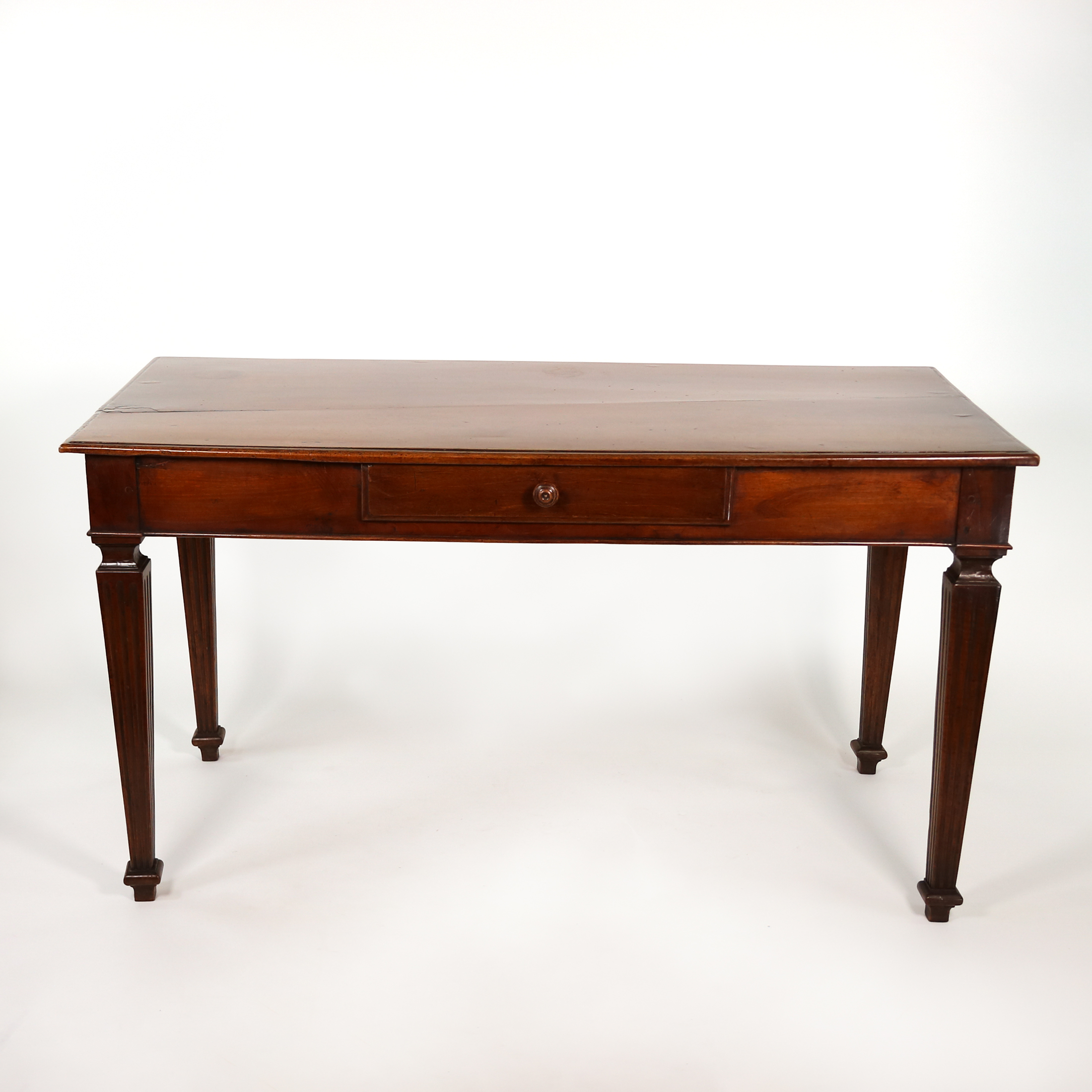 Italian walnut writing table, circa 1800, frontal studio view.