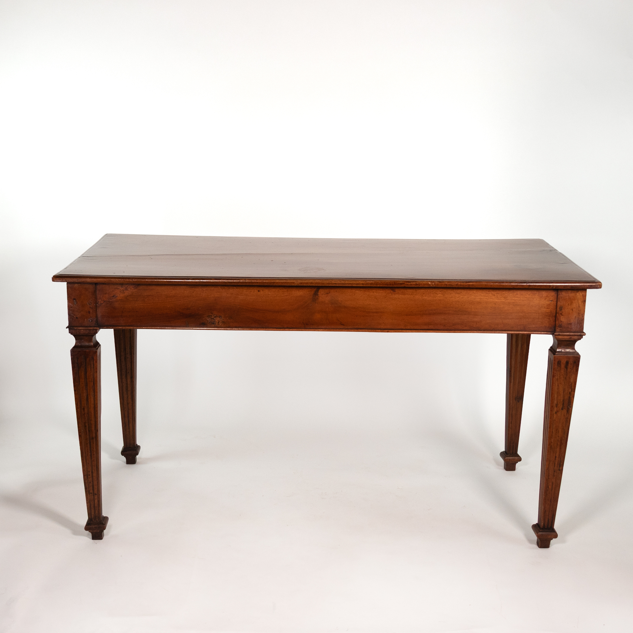 Italian Neoclassical walnut writing table, circa 1800, rear view.