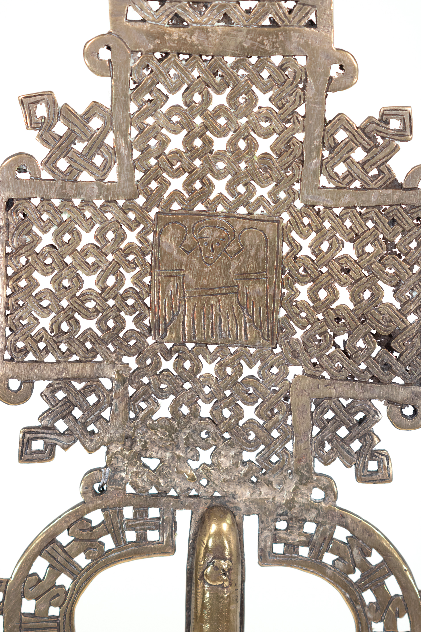 Detail of Ethiopian processional cross central plaque incised with a winged angel figure